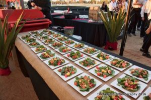 Salads of fresh watermelon, ripe figs, caramelized walnuts, tender spinach and fresh orange vinaigrette. Photo courtesy Tia Gemmell and Center for Land-Based Learning